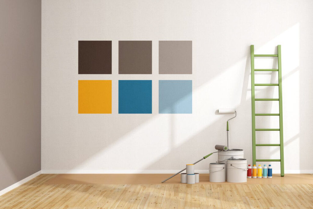 Painter Testing A Variety Of Colours For A Small Feature Wall Paintwork